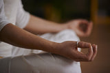 woman meditating with hand mudra 